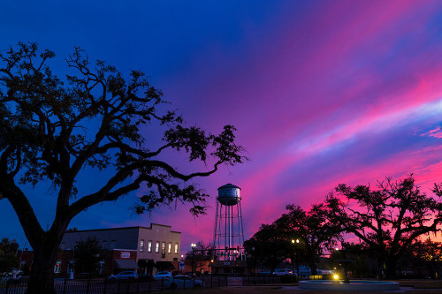 Watertower Sunset Poster Print - Will Malone