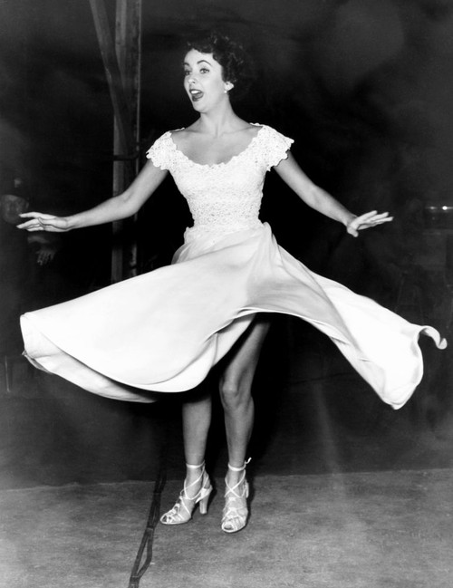 A Place In The Sun, Elizabeth Taylor, Giving Her Edith Head Dress A Twirl During A Portrait Sitting, February 1950 Poster Print