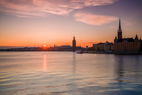 Sweden-Stockholm-Stockholm City Hall and Riddarholmen church-sunset Poster Print - Walter Bibikow # VARPDXEU28WBI0523