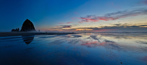 USA- Oregon. Cannon Beach and panorama of Haystack at sunset and low tide. Poster Print - Darrell Gulin (24 x 10)