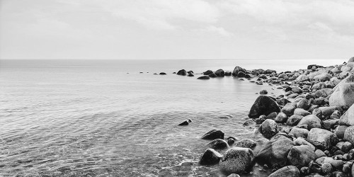 Pebbles on the Beach (BAndW) Poster Print - Images Pangea (36 x 18)