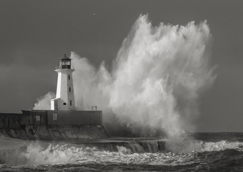 Lighthouse in raging Sea