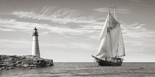 Sailboat approaching Lighthouse, Mediterranean Sea