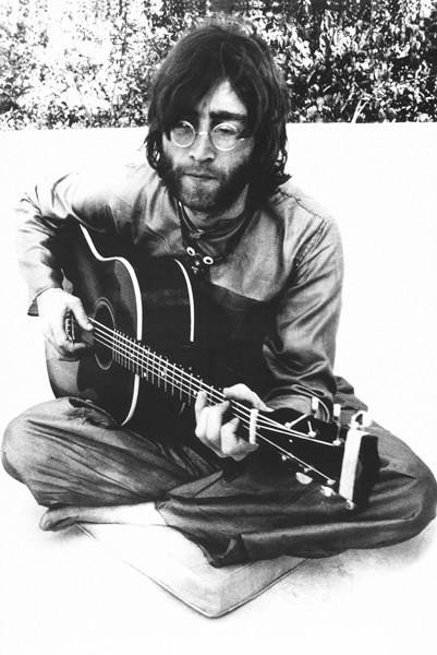 John Lennon Sitting Sitting With Guitar Poster Print