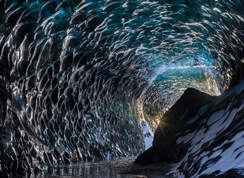 Ice cave at the northern shore of glacial lagoon Jokulsarlon in glacier Breidamerkurjokull by Martin Zwick - Item # VARPDXEU14MZW2332