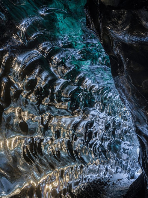 Ice cave at the northern shore of glacial lagoon Jokulsarlon in glacier Breidamerkurjokull by Martin Zwick - Item # VARPDXEU14MZW2339