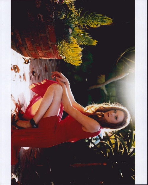 Christiane Seidel Crouched In Red Dress Photo Print - Item # MVM59351