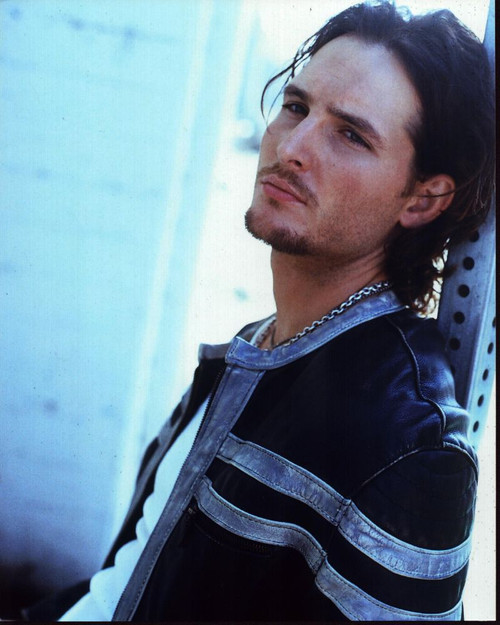Peter Facinelli In Leather Jacket Leaning On Post Photo Print