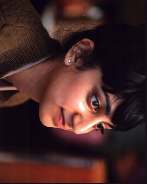 Sunita Mani Side View In Brown Sweater Photo Print - Item # MVM55250