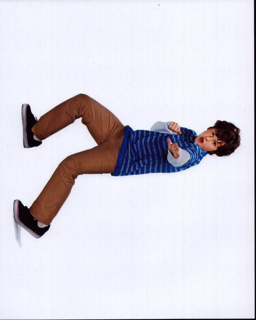 Nolan Gould Posing In Striped Shirt And Brown Pants Photo Print - Item # MVM58631 Nolan Gould Posing In Striped Shirt And Brown Pants Photo Print - Item # MVM58631