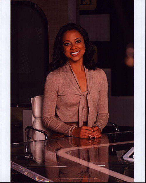 Nischelle Turner At Glass Desk Photo Print - Item # MVM56863