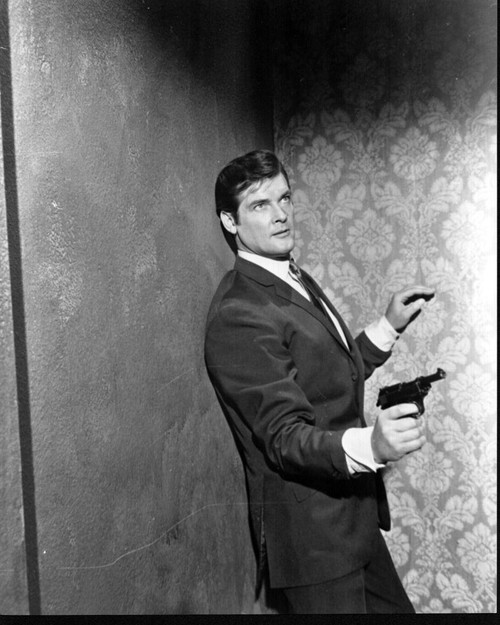 Roger Moore Holding Gun In The Saint Black And White Photo Print - Item # MVM55899