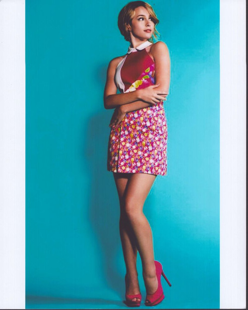 Bridgit Mendler In Pink Floral Skirt Blue Background Photo Print - Item # MVM56776