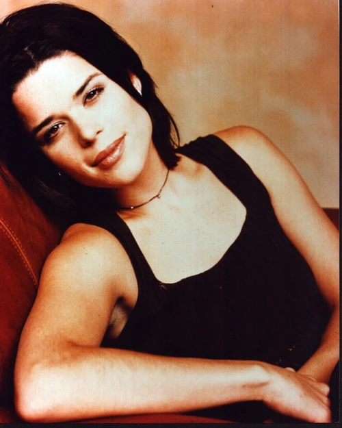 Neve Campbell Sitting In Black Tank Top Photo Print