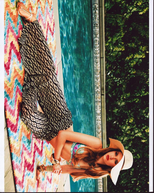 Tiera Skovbye Laying Next To Pool Photo Print
