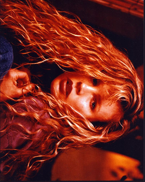 Kim Basinger Leaning On Knees Photo Print