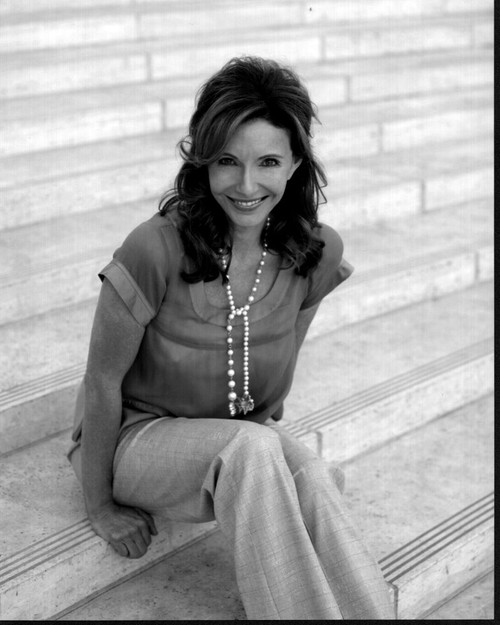 Mary Steenburgen Sitting On Steps In Gray Top Photo Print - Item # MVM55773