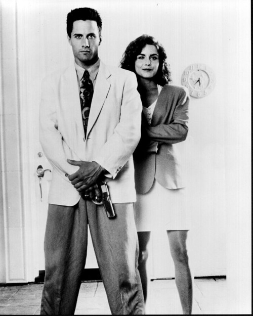 Rob Estes And Mitzi Kapture Posed For Silk Stalkings Black And White Photo Print - Item # MVM57683