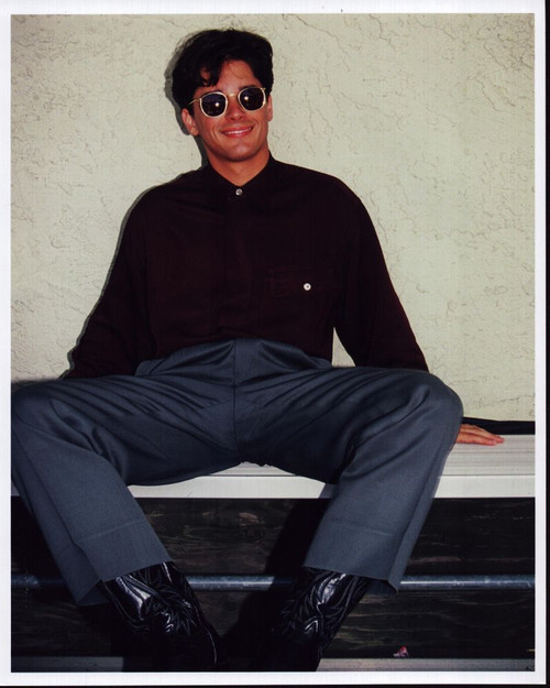 Billy Warlock Sitting In Sunglasses And Cowboy Boots Photo Print - Item # MVM70131