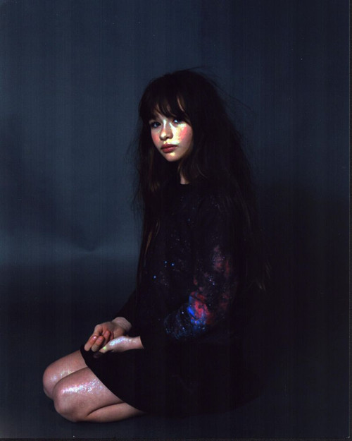 Malina Pauli Weissman Kneeling In Galaxy Print Dress Photo Print - Item # MVM55756