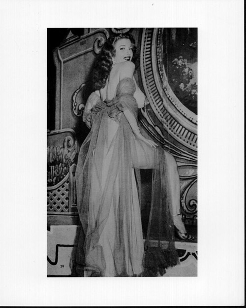 Tempest Storm With Knee Up Looking Over Shoulder Black And White Photo Print