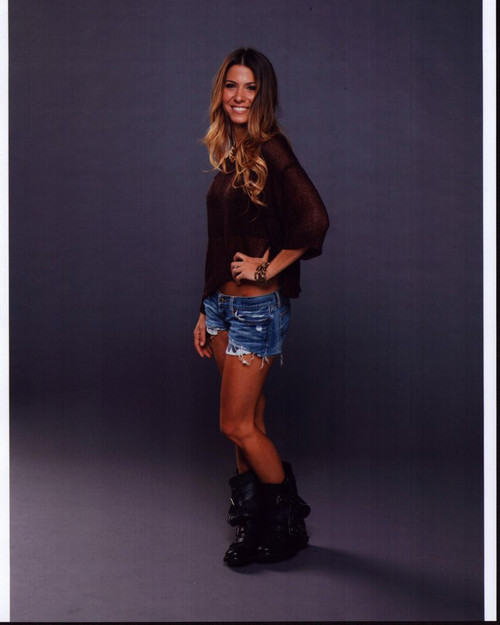 Orly Shani In Cut Off Shorts And Brown Top With Hand On Hip Photo Print - Item # MVM54991