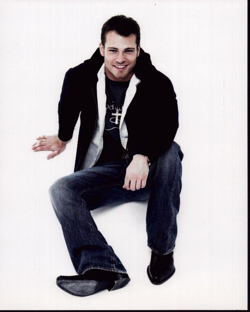 Shawn Roberts Sitting On Floor In Jeans And Jacket Photo Print - Item # MVM59423