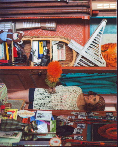 Kristen Wiig With Feather Duster In The Diary Of A Teenage Girl Photo Print - Item # MVM55388