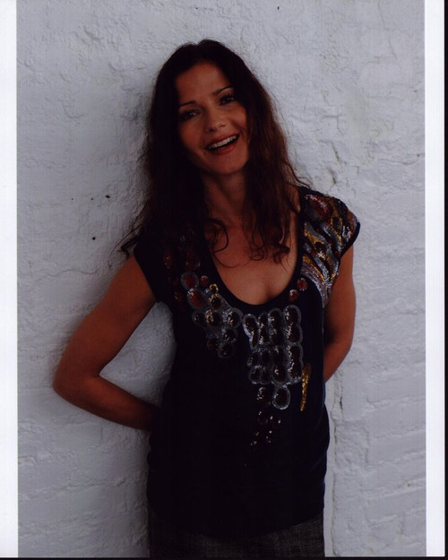 Jill Hennessy Against Wall In Sequin Detail Top Photo Print - Item # MVM55416