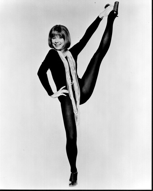 Shirley Maclaine In Leg Up In Long Pearl Necklaces Black And White Photo Print - Item # MVM54829