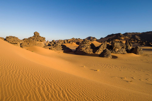 Rock formations and sand dunes in the Akakus-Fezzan-Libya Poster Print - Sergio Pitamitz