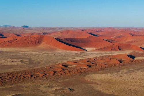 An aerial view of red sand dunes in the Namib desert Namibia Poster Print - Sergio Pitamitz