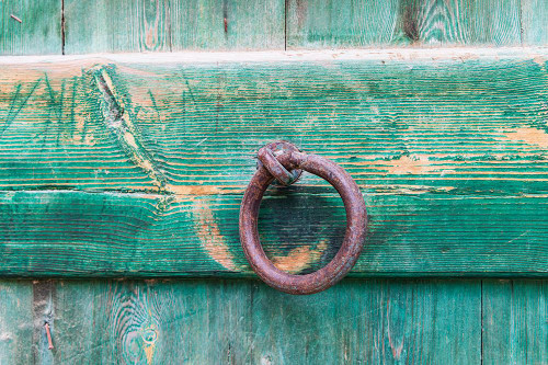 Faiyum-Egypt Iron ring on a green painted wooden gate Poster Print - Emily M. Wilson