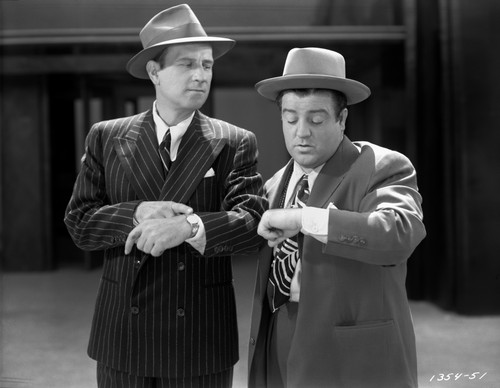 Abbott & Costello in Suit and Hat Looking at the Time Photo Print - Item # VARCEL680760