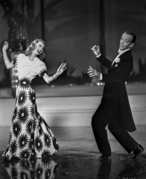 Fred Astaire and Ginger Rogers Ballroom Dancing and smiling to Each Other Photo Print - Item # VARCEL680851