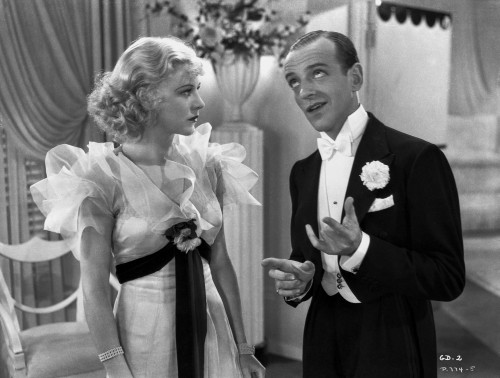 Fred Astaire and Ginger Rogers Conversing in Suit and Dress Photo Print - Item # VARCEL680885
