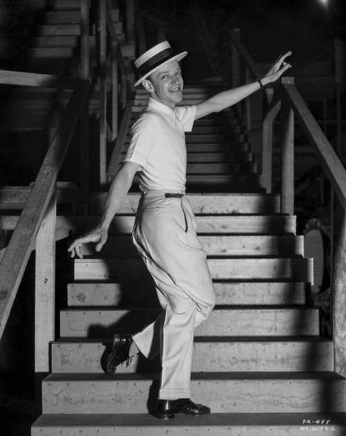 Fred Astaire standing on Dining Table Photo Print - Item # VARCEL680896