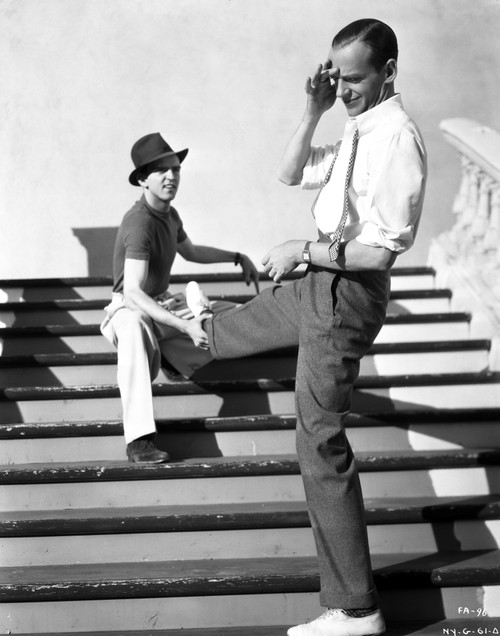 Fred Astaire Stretching Legs on Stairs Black and White Photo Print - Item # VARCEL680916