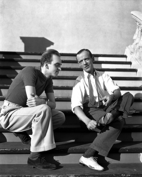 Fred Astaire Seated on Stairs in White Shirt Black and White Photo Print - Item # VARCEL680921
