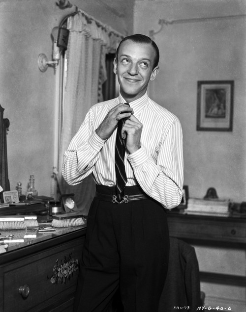 Fred Astaire Fixing Neck Tie in Black and White Photo Print - Item # VARCEL680932