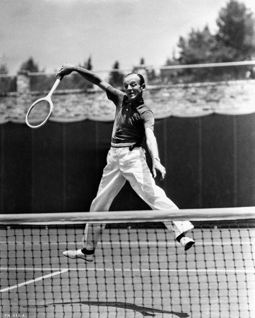 Fred Astaire Playing Tennis in Polo Shirt Photo Print - Item # VARCEL680990