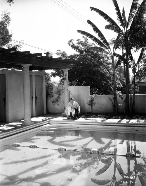 Fred Astaire Seated by the Poolside Black and White Photo Print - Item # VARCEL680996