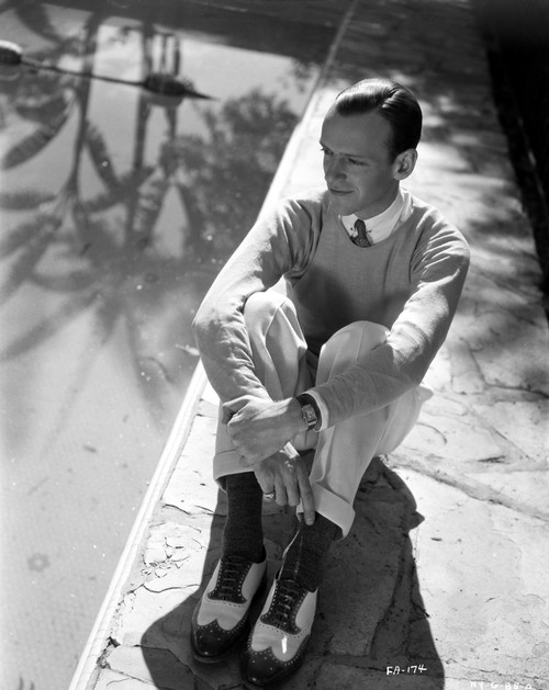 Fred Astaire Seated in Sweater Photo Print - Item # VARCEL681017
