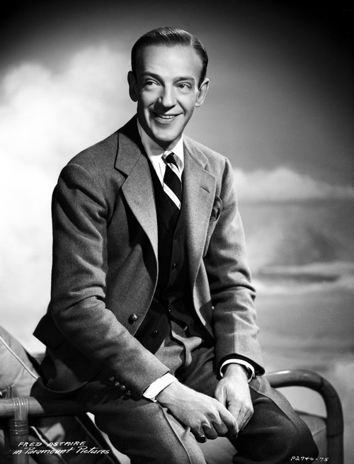 Fred Astaire Seated on Arm Chair in Black and White Photo Print - Item # VARCEL681110