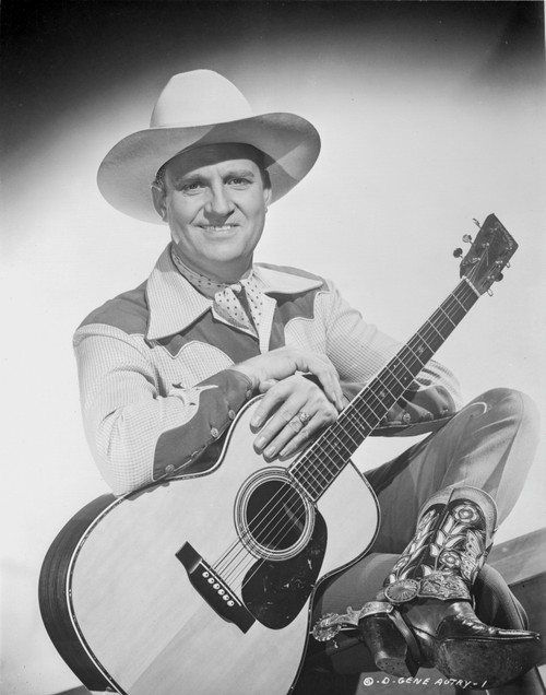 Gene Autry with a cowboy hat and guitar Photo Print - Item # VARCEL681131