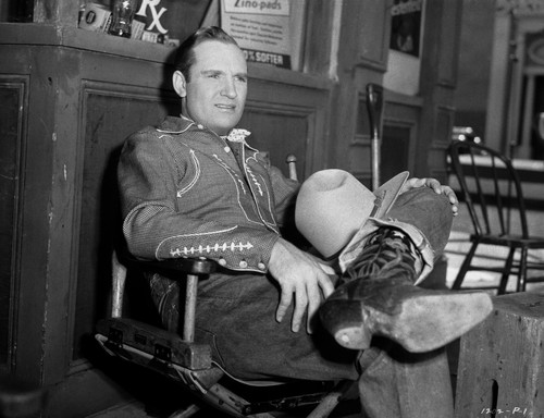 Gene Autry Seated on Chair with his Legs Crossed Photo Print - Item # VARCEL681136