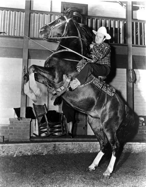 Gene Autry riding a horse Photo Print - Item # VARCEL681150