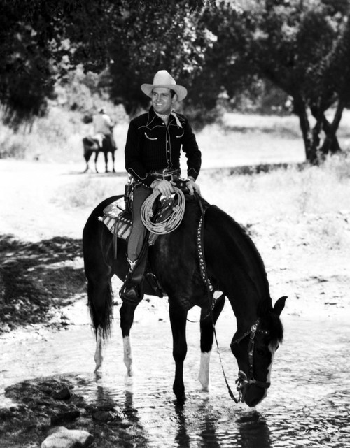 Gene Autry Riding a Horse Drinking Water Photo Print - Item # VARCEL681155