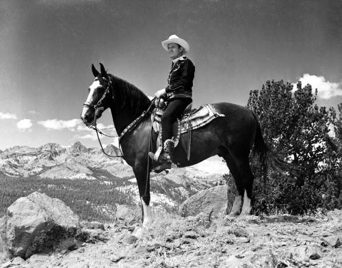 Gene Autry Riding a Horse in a Westerner Outfit Photo Print - Item # VARCEL681156