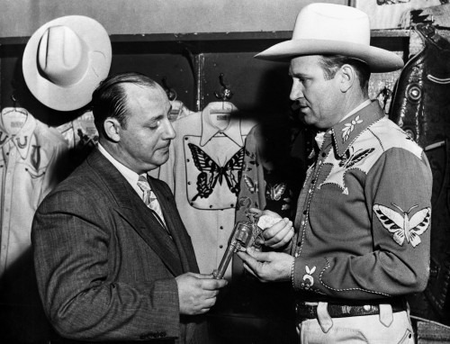 Gene Autry Talking to a Man in Suit Photo Print - Item # VARCEL681197